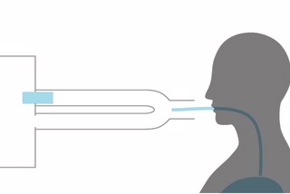 Silhouette of a person undergoing a breathalyzer test with a tube connected to the mouth.