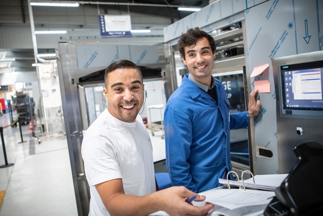 Employees smiling