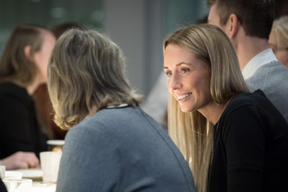 People smiling at the meeting