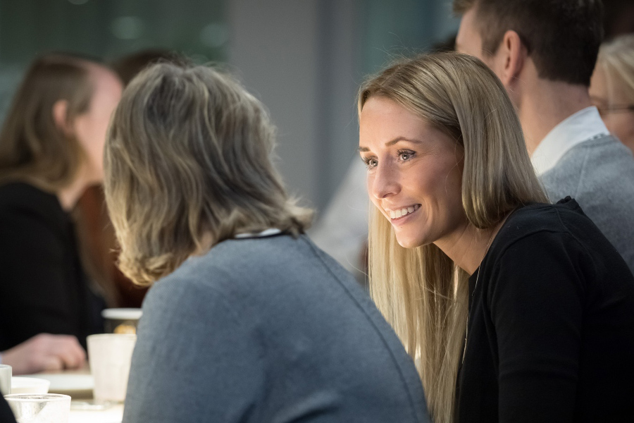 People smiling at the meeting People smiling at the meeting