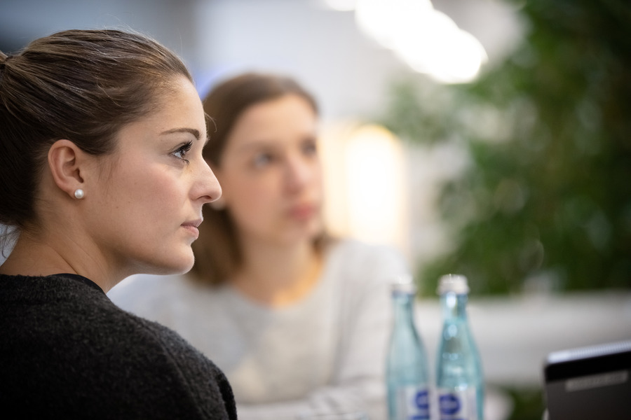 Concentrated woman in meeting