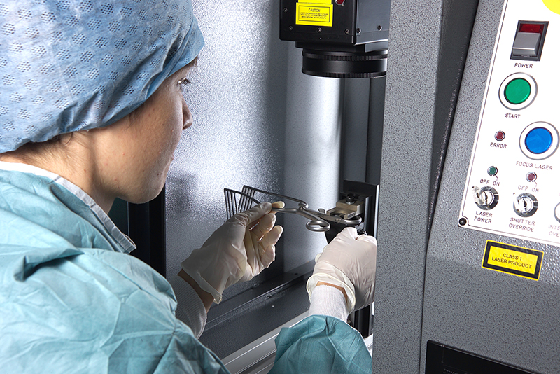 nurse using the Getinge laser marking instrument