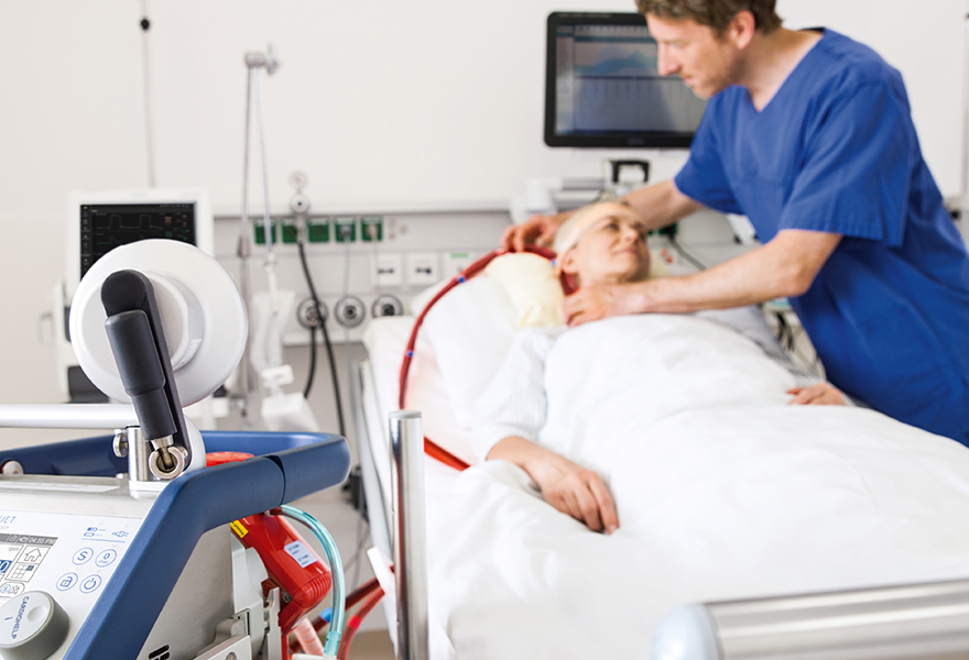 Male nurse takes care of a patient Male nurse takes care of a patient