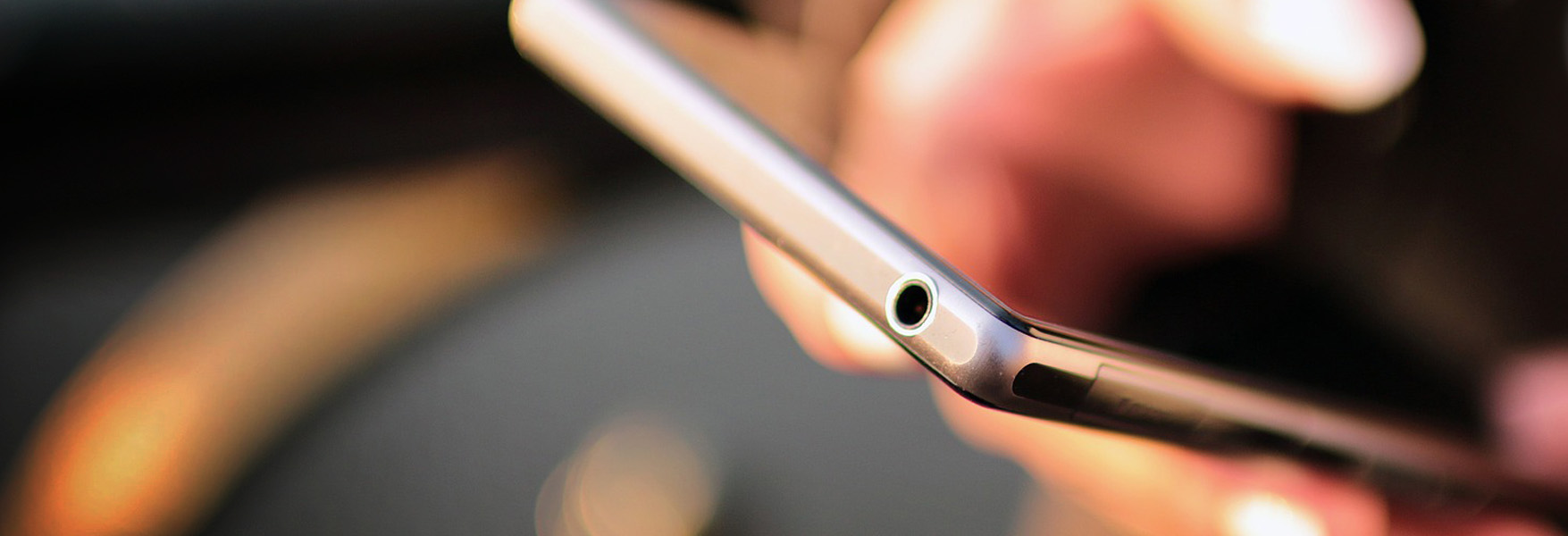 Hand holding phone Hand holding phone