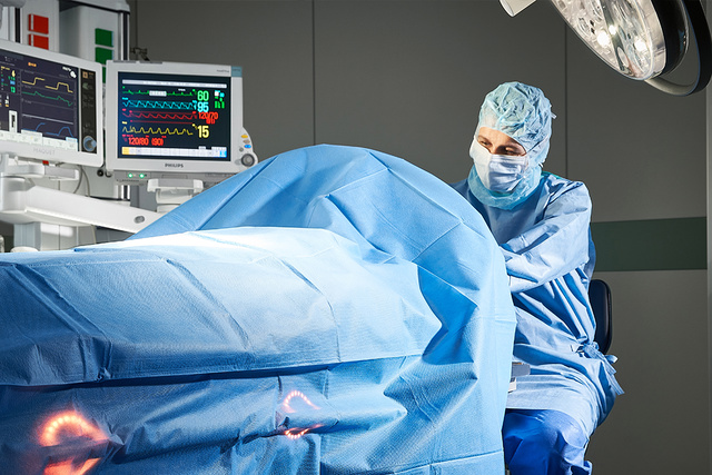 Surgeon at Maquet Corin operating table