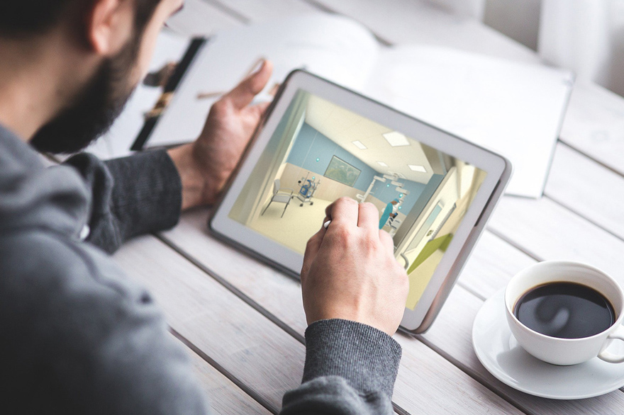Man with a tablet and cup of coffee Man with a tablet and cup of coffee
