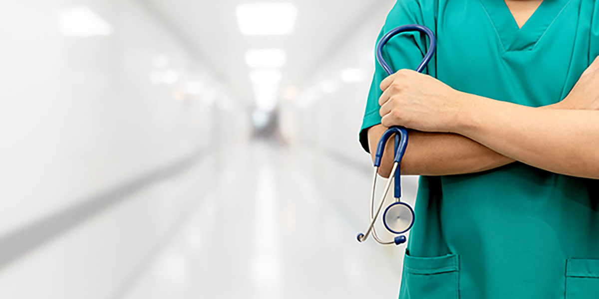 Man holding stethoscope