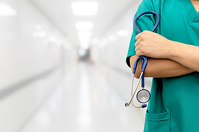 Man holding stethoscope