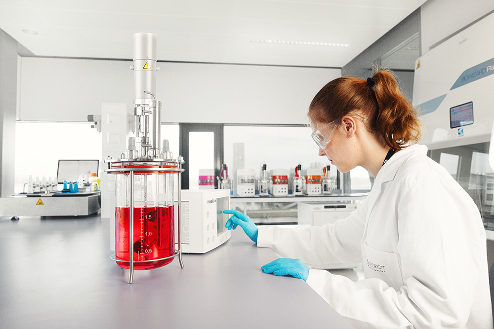 Scientist in lab with in-Control Scientist in lab with in-Control