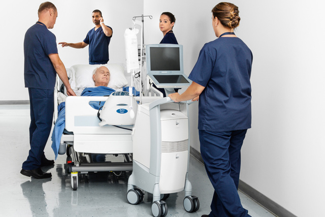 Four nurses and one patient under Cardiosave IABP Hybrid in the hallway