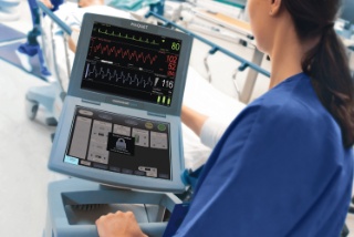 Nurse looking at Cardiosave IABP Hybrid panel
