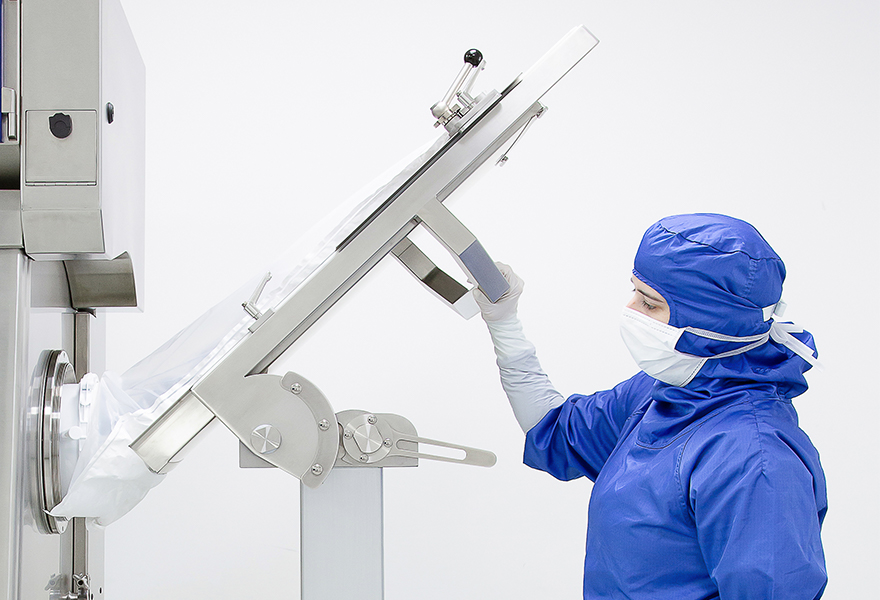An operator tilting the DPTE® Transfer Trolley's platform An operator tilting the DPTE® Transfer Trolley's platform