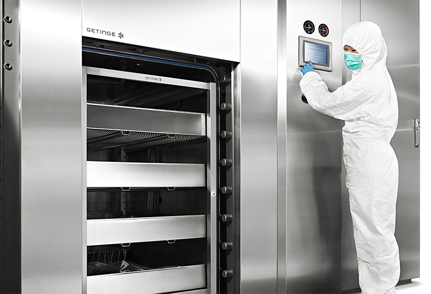 An operator using a GEB sterilizer An operator using a GEB sterilizer