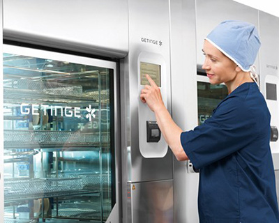 nurse monitoring the Getinge 86-Series disinfector