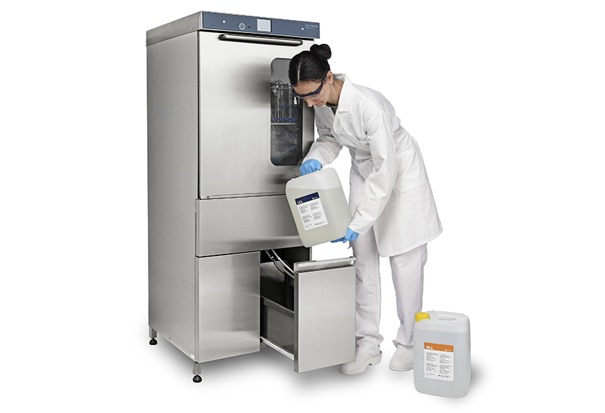 An operator is handling LLL Detergent and NLL Neutralizer An operator is handling LLL Detergent and NLL Neutralizer