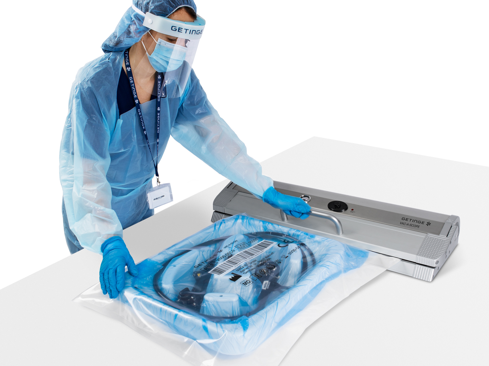 Operator working with Getinge Vac-a-Scope system for flexible endoscopes