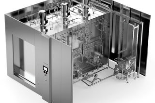 Stainless steel industrial machine with pipes, valves, and control panel in a sterile environment.