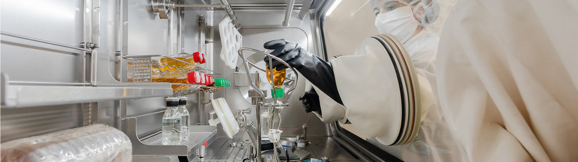 Operator using the ISOPRIME isolator for sterility testing Operator using the ISOPRIME isolator for sterility testing