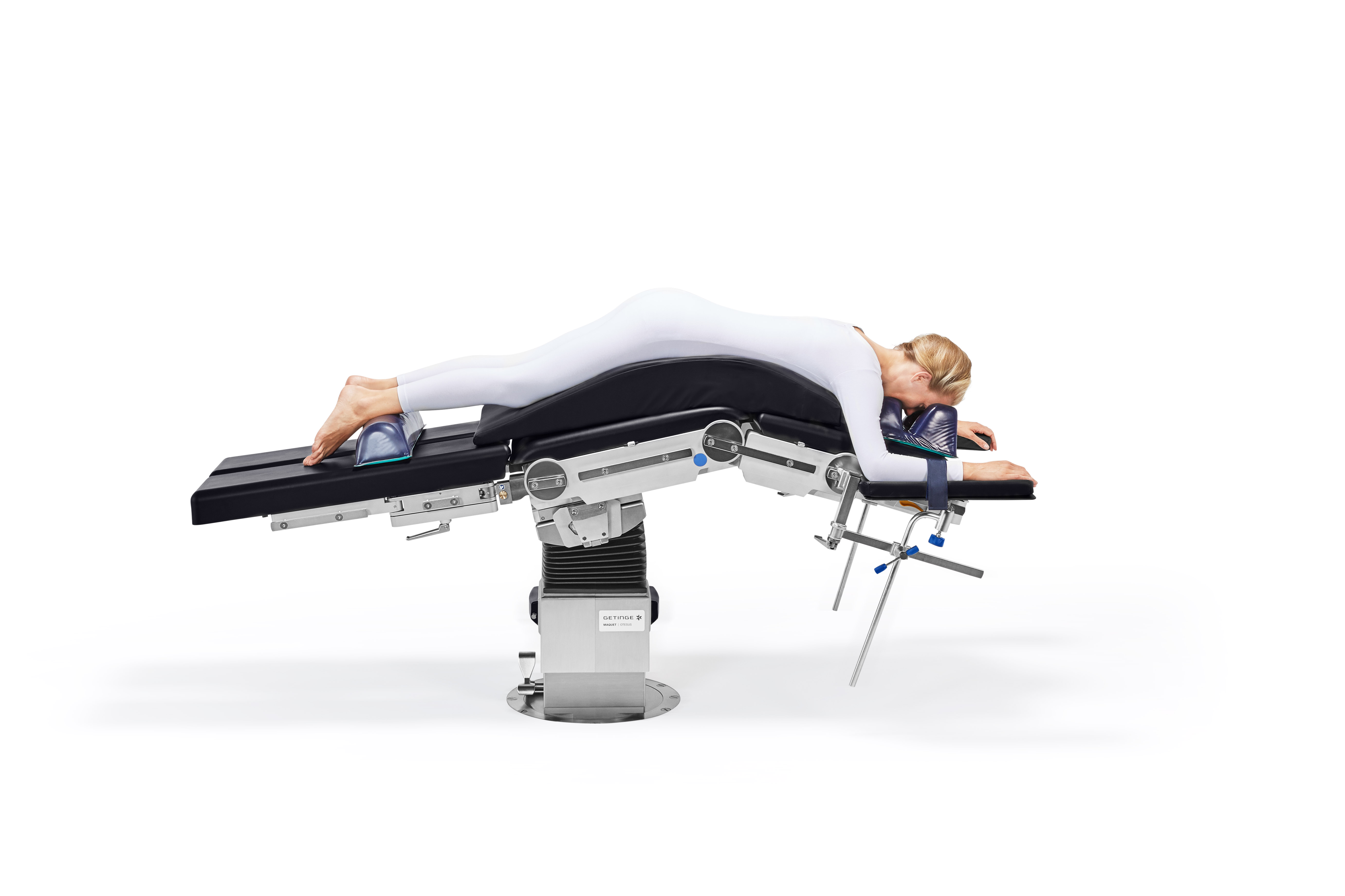 patient lying in prone position on otesus operating table patient lying in prone position on otesus operating table