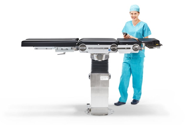 Otesus operating table lifted up and nurse