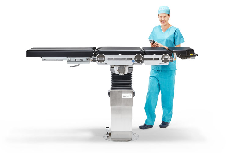 Otesus operating table lifted up and nurse