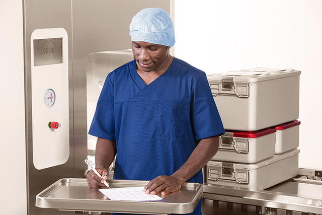 Sterile assistant filling in Meditrax sterilizer record