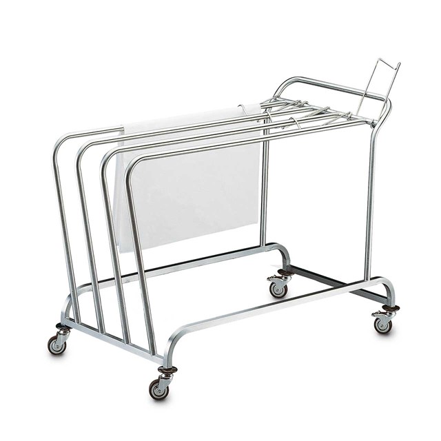 Movable trolley for storing 4 different sizes of sterilizing wrapping paper sheets at the packing stations.