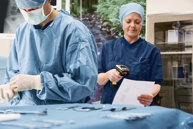 Doctors with instruments and trays