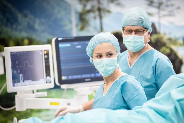 Nurse monitoring patient