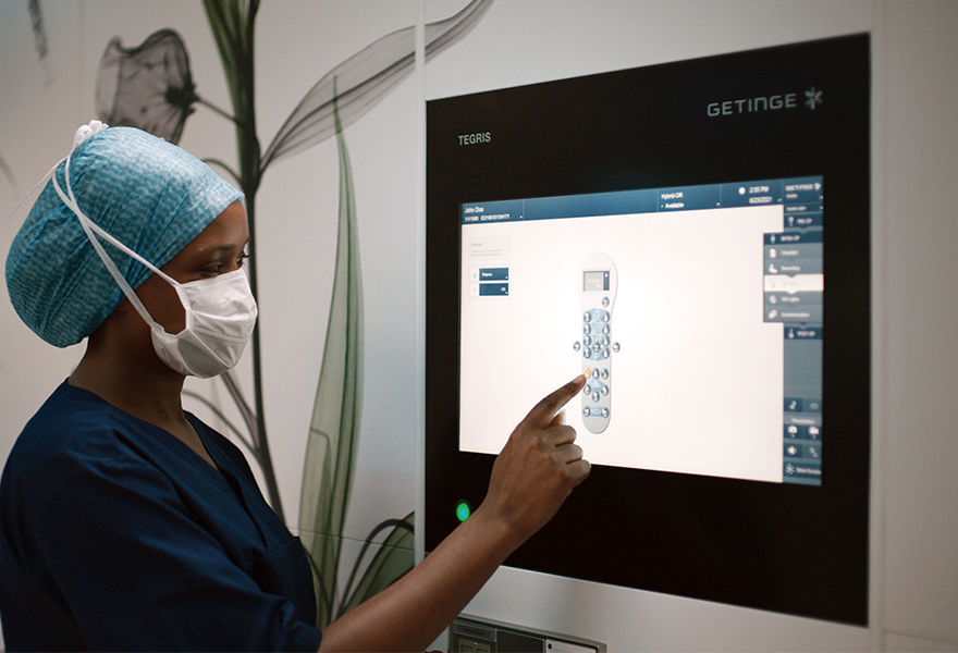 OR nurse adjusts OR table with Tegris OR integration solution OR nurse adjusts OR table with Tegris OR integration solution