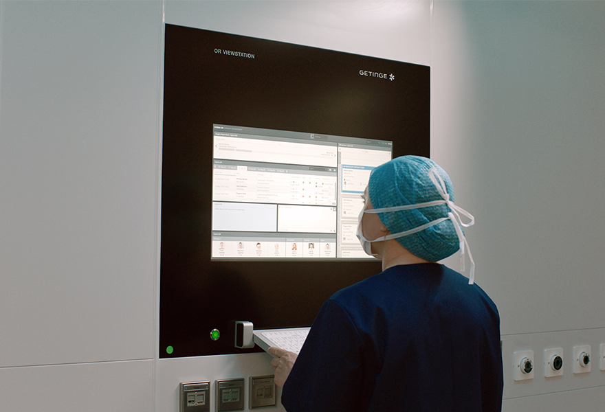 OR nurse is working on screen in the OR OR nurse is working on screen in the OR