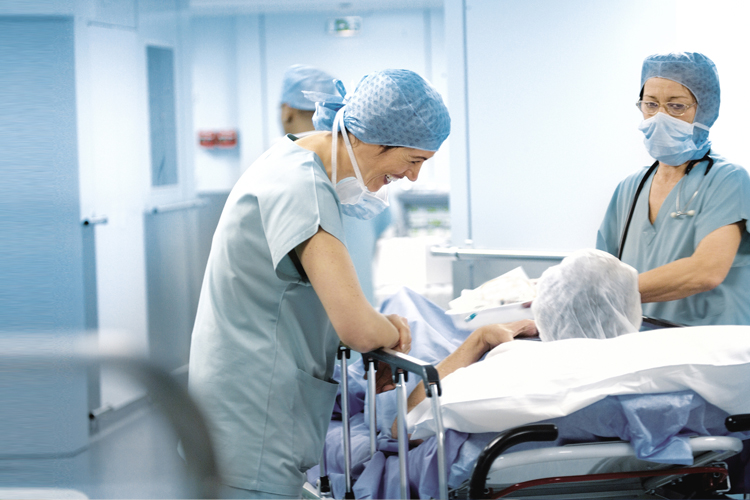 Doctor smiling to a patient