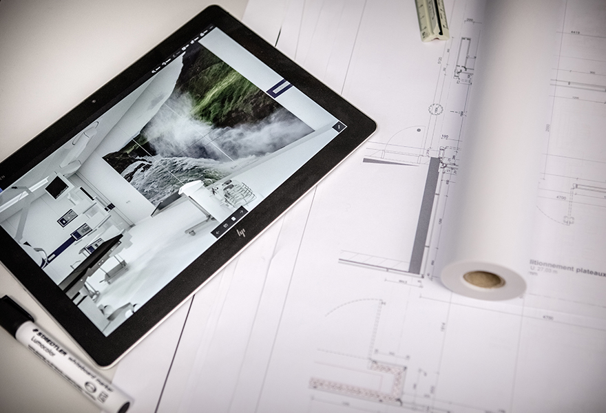 Tablet with OR sketch on a construction plan Tablet with OR sketch on a construction plan